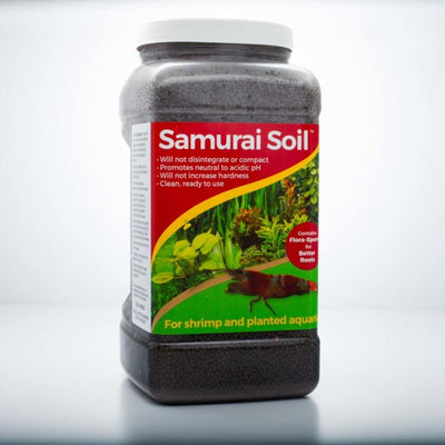 CaribSea Samurai Soil in a clear plastic container with a red and green label, featuring aquatic plants and a shrimp.