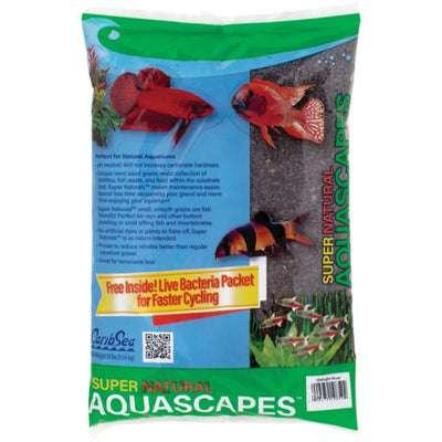 Bag of CaribSea Super Natural Aquascapes Midnight River aquarium sand with fish and text on the label.