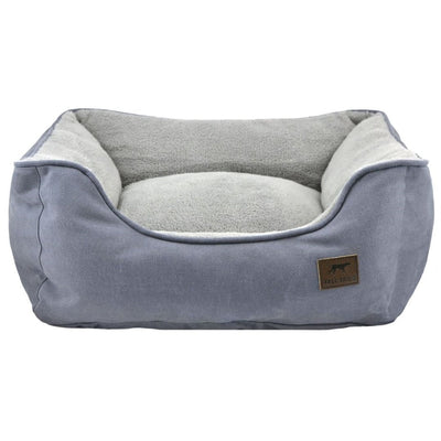 Charcoal gray dog bolster bed with a soft, light gray fleece interior and a brown "Tall Tails" brand tag.