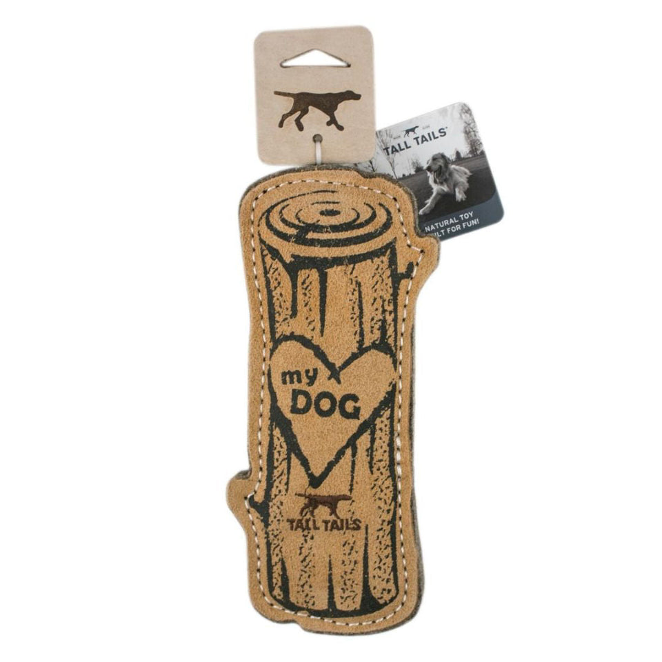 Brown dog toy shaped like a log with "my DOG" in a heart, hanging from a Tall Tails tag.