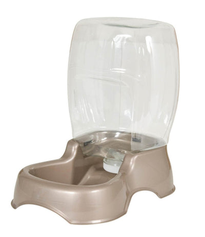 Tan Petmate Pet Cafe Waterer with a clear water reservoir, angled view.