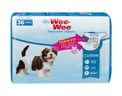 Fluffy brown and white puppy wearing a Wee-Wee diaper on the X-Small package