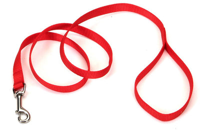Red nylon leash coiled showing metal clasp and loop handle