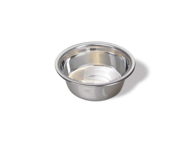 A shiny, empty, silver stainless steel pet bowl is angled on a white background, casting a soft shadow.