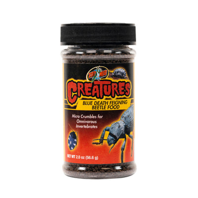 Clear jar of Zoo Med Creatures Blue Death Feigning Beetle Food, with a black lid and label, on a white background.