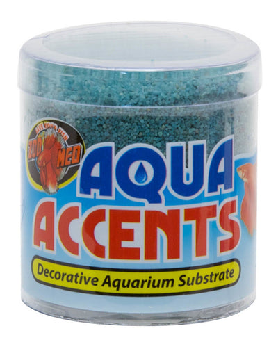 Clear plastic container of teal aquarium sand with a blue and red "Aqua Accents" label.