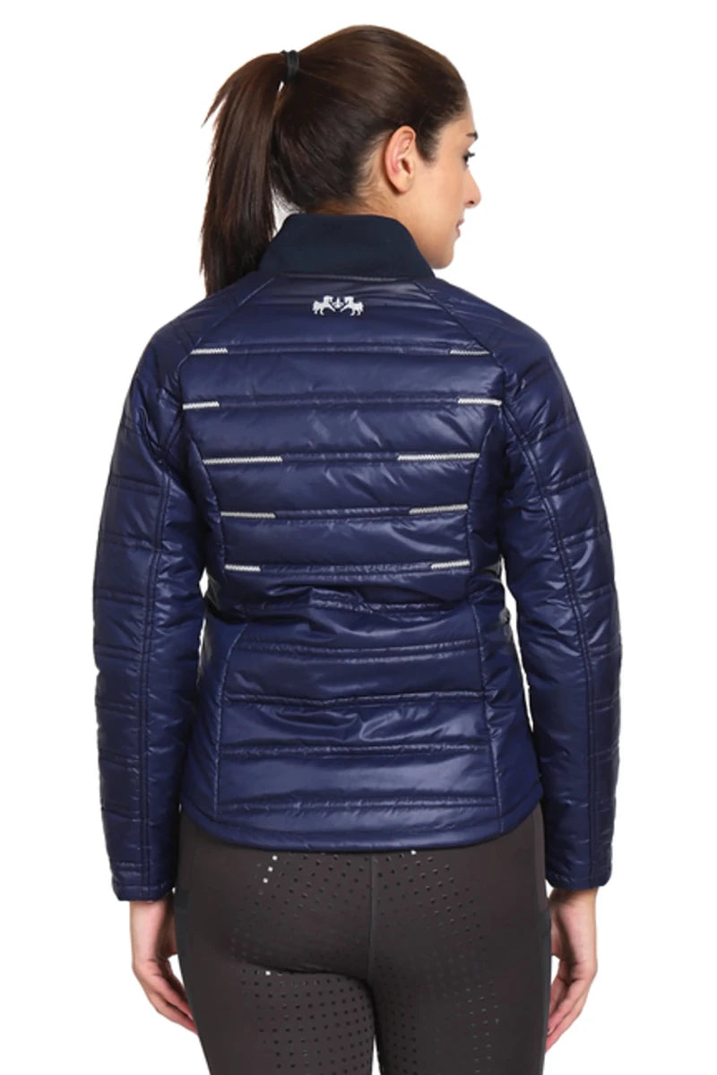 Woman wearing navy blue EQUINE COUTURE LADIES ALPINE PUFFER JACKET viewed from the back, equestrian style.