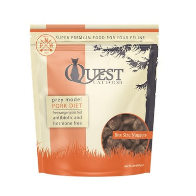 Pork cat food in an orange and cream pouch with a clear window showing bite-size nuggets.