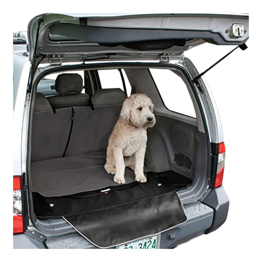 Rover Cargo Cape lining a car trunk with a shaggy dog sitting on it