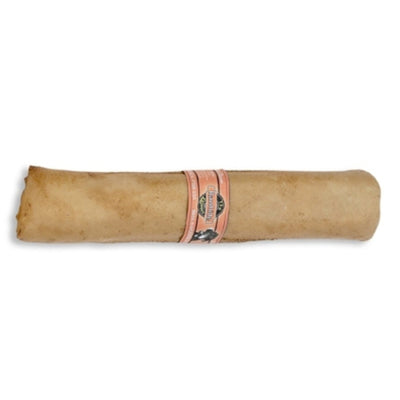 Rolled dog treat with a peanut butter brand band wrapped around the middle