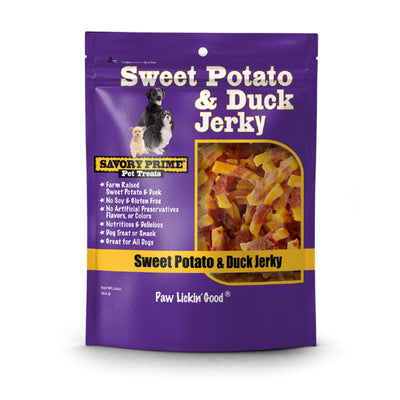 Purple pouch of Savory Prime Sweet Potato & Duck Jerky dog treats with a window showing the product and three dogs.