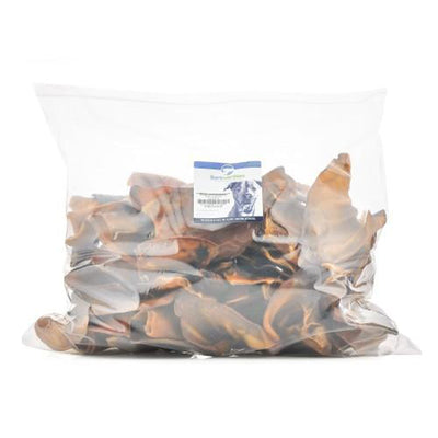 Clear bulk bag packed with curled dried pig ear chews