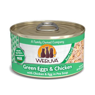 Angled view of a Weruva cat food can, green label with "Green Eggs & Chicken" and "Real Food!" text.
