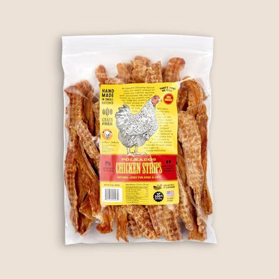 Clear plastic bag of Polkadog Chicken Strips jerky for dogs and cats, showing many golden-brown strips and a yellow label.