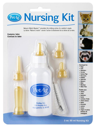 Pet-Ag Nursing Kit with a 2 oz bottle, three nipples, and a cleaning brush in clear packaging.