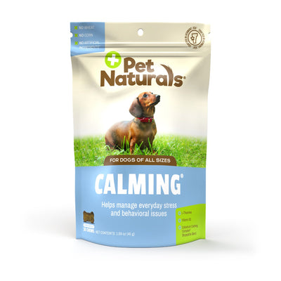 Front view of Pet Naturals Calming chews for dogs, showing a dachshund on the package and key ingredients.