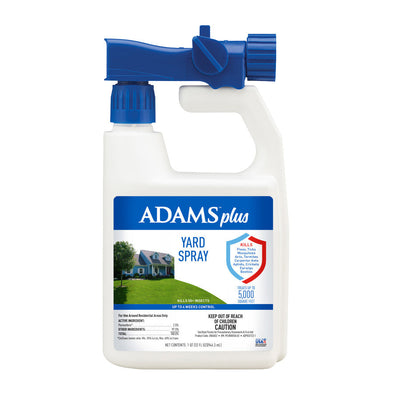White jug bottle with blue spray nozzle and house and lawn label