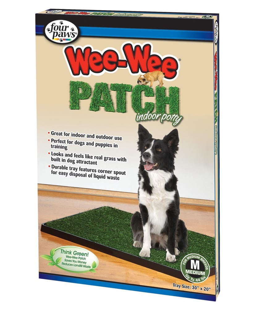Border collie sitting on the Wee-Wee grass patch potty tray on packaging