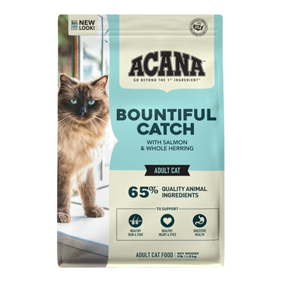 Acana Bountiful Catch cat food bag, light blue and cream, with a brown cat looking out a window on the left.
