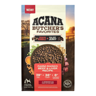 Acana Butcher's Favorites dog food bag with a bowl of kibble and jerky, fresh beef, and peas, set against a farm sunset.