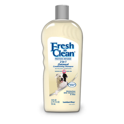 Cream-colored bottle of oatmeal conditioning shampoo with dog on label, tropical scent