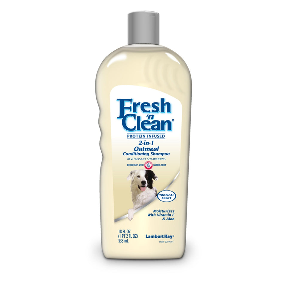 Cream-colored bottle of oatmeal conditioning shampoo with dog on label, tropical scent