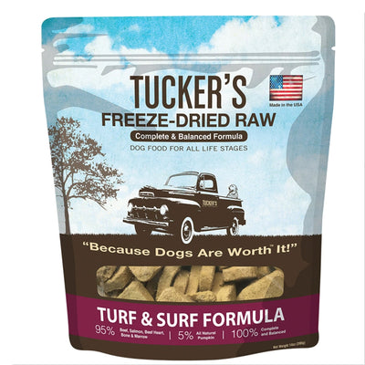 Tuckers Turf & Surf freeze-dried raw dog food in a 14oz bag with a vintage truck and dog graphic.