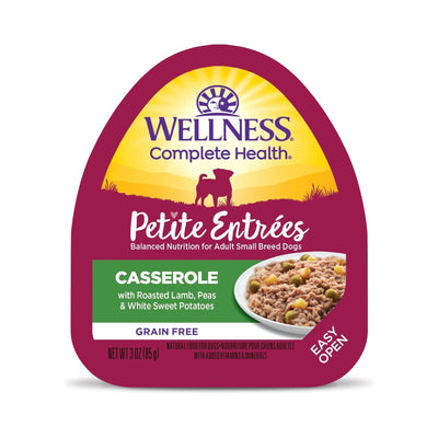 A single 3oz container of Wellness Complete Health Petite Entrées Casserole with Roasted Lamb, Peas & White Sweet Potatoes.