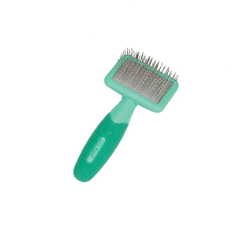Slicker brush with fine wire bristles and a green textured handle