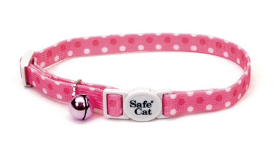 Pink polka-dot breakaway cat collar with silver bell and white buckle