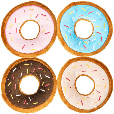 Four plush donut dog toys with sprinkles: pink, blue, chocolate, and vanilla, arranged in a square on a white background.