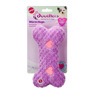 Purple plush bone dog toy with pink hearts and a SPOT logo, in clear retail packaging with a small dog photo.
