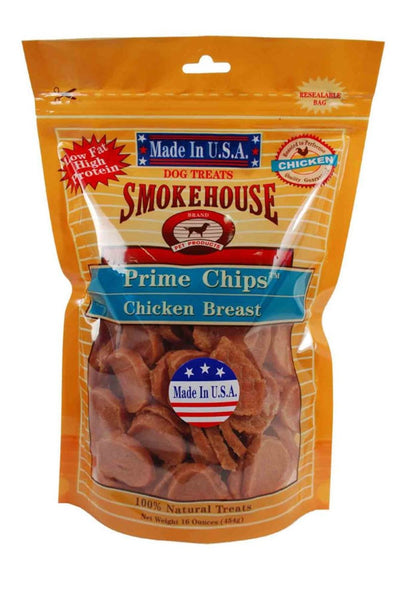 Orange resealable bag of Smokehouse Prime Chips Chicken Breast dog treats, showing the product through a clear window.