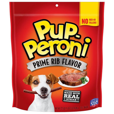 Red bag of Pup-Peroni Prime Rib dog treats with a dog holding a treat and a prime rib steak.
