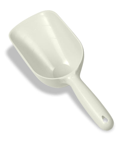 A white plastic pet food scoop with a handle and measurement markings is angled on a white background.