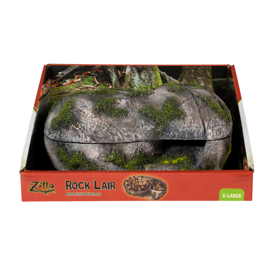 X-Large Zilla Rock Lair, a mossy gray rock hideaway for reptiles, shown in its open-top box with a snake.