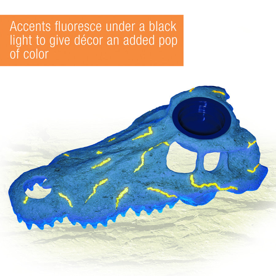 Blue crocodile skull decor with glowing yellow accents and a dark blue UV sensor, viewed from the front-right.