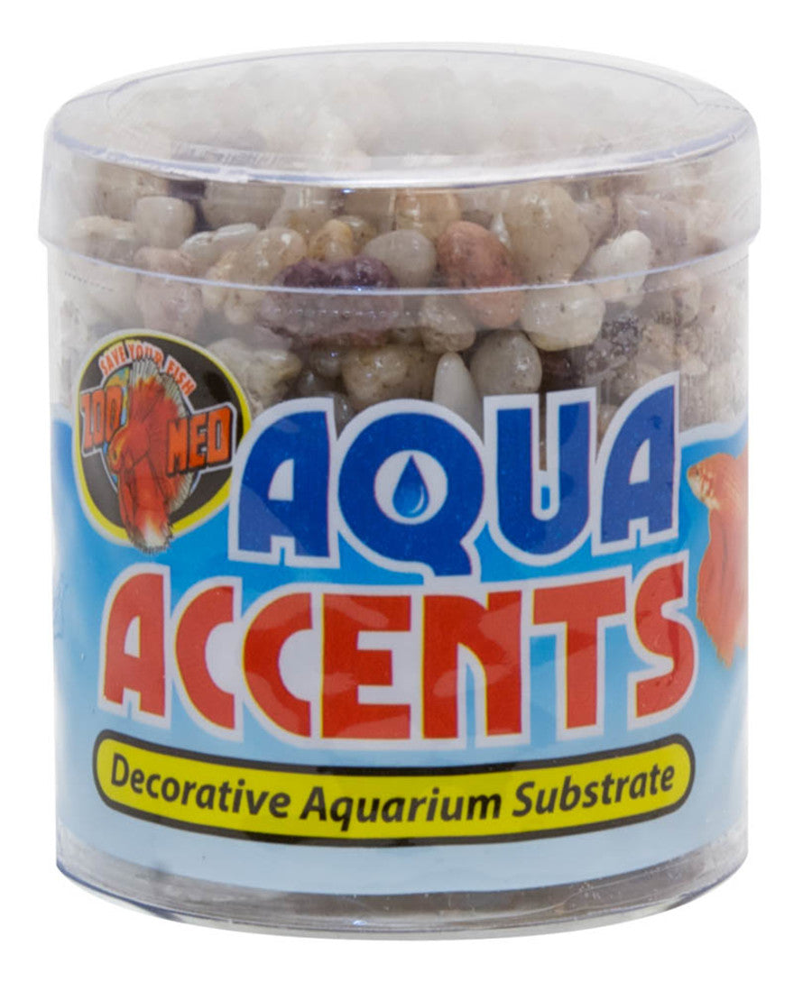 Clear plastic container of Zoo Med Aqua Accents River Pebbles, light-colored, with a blue and red label.