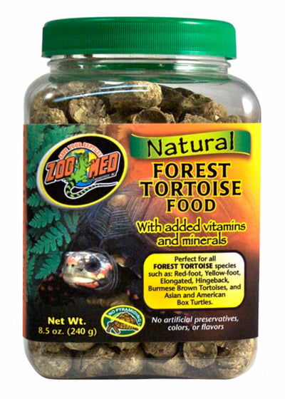 8.5 oz clear jar of Zoo Med Natural Forest Tortoise Food, showing brown pellets and a label with a tortoise.