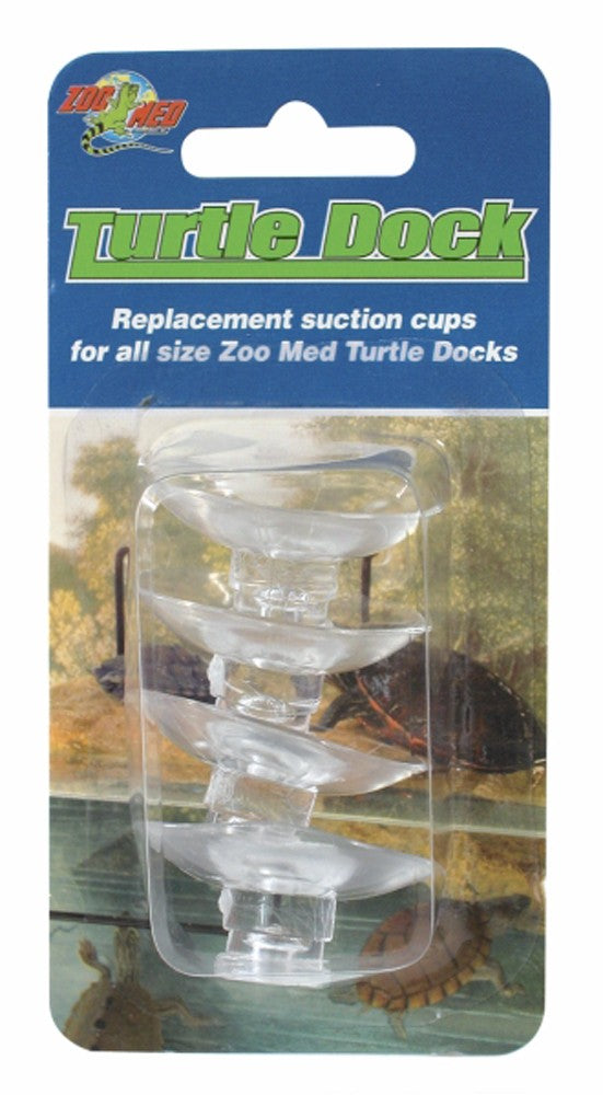 Four clear suction cups for a turtle dock are visible in their plastic packaging against a background of a turtle in water.
