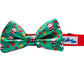 Cutie Ties Dog Bow Tie with festive Christmas pattern on green fabric and red adjustable strap for pets