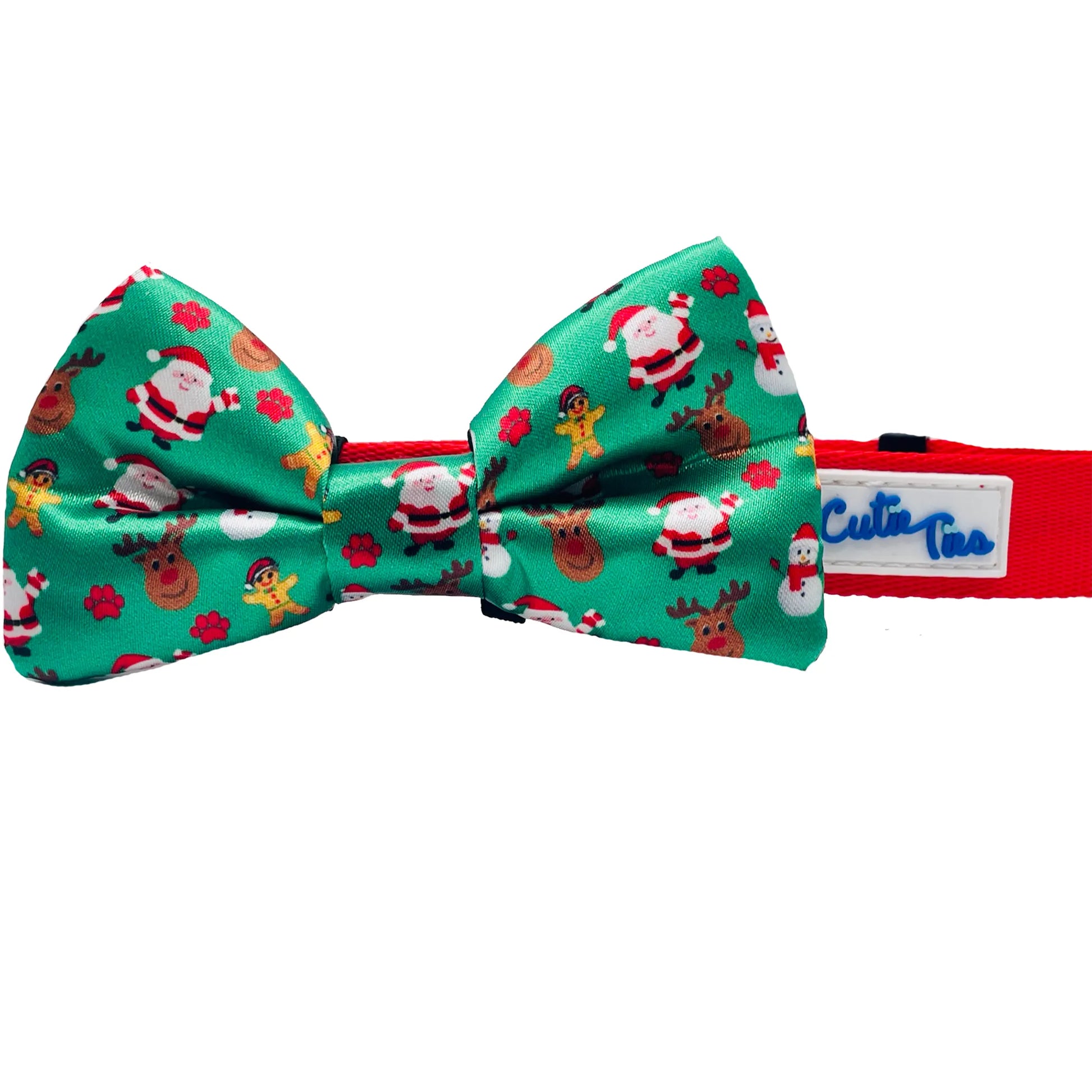 Cutie Ties Dog Bow Tie with festive Christmas pattern on green fabric and red adjustable strap for pets