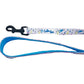 Cutie Ties Fun Design Dog Leash with colorful pattern, blue padded handle, and black metal clasp for secure dog walking.