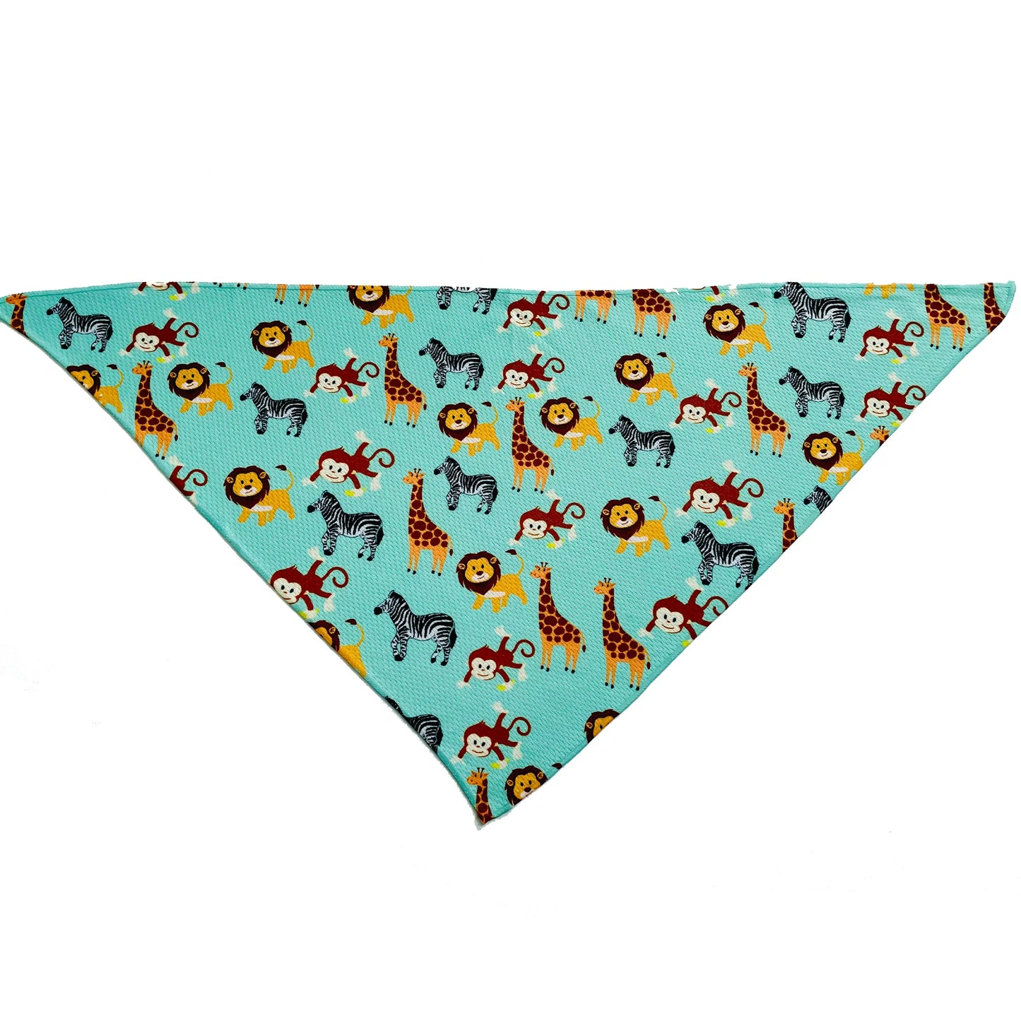 Cutie Ties Tie On Dog Bandana with colorful lion, giraffe, zebra, and monkey print on turquoise background