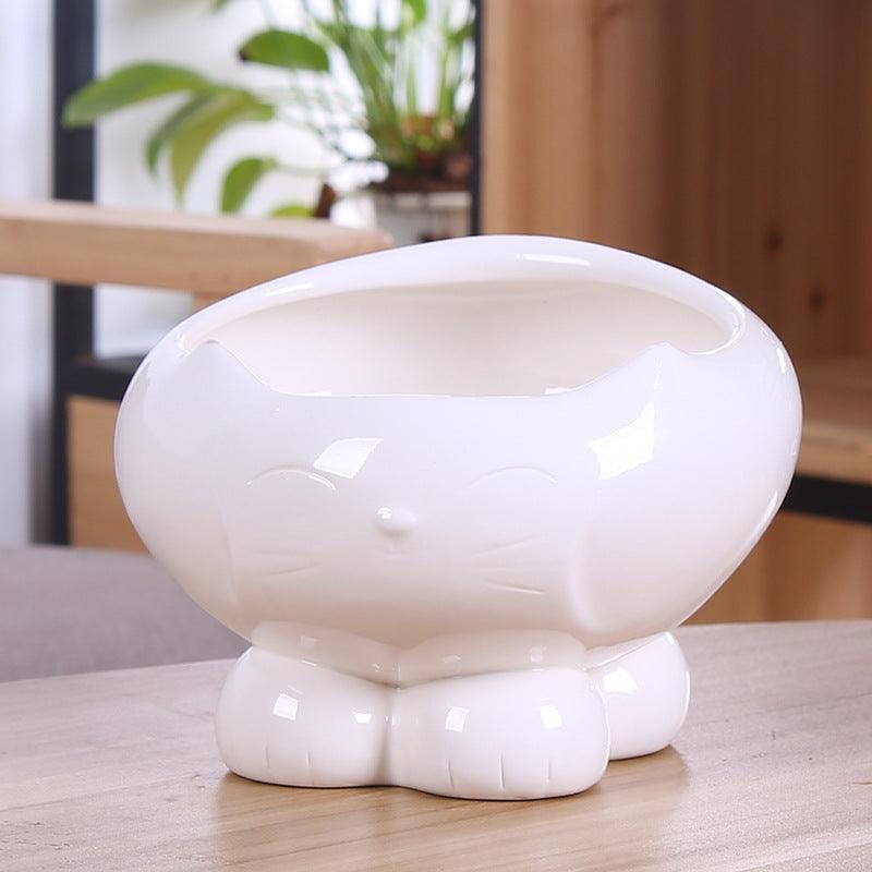 Pet Oasis: Resin Cat Feeder And Water Dispenser - Pets Perfect