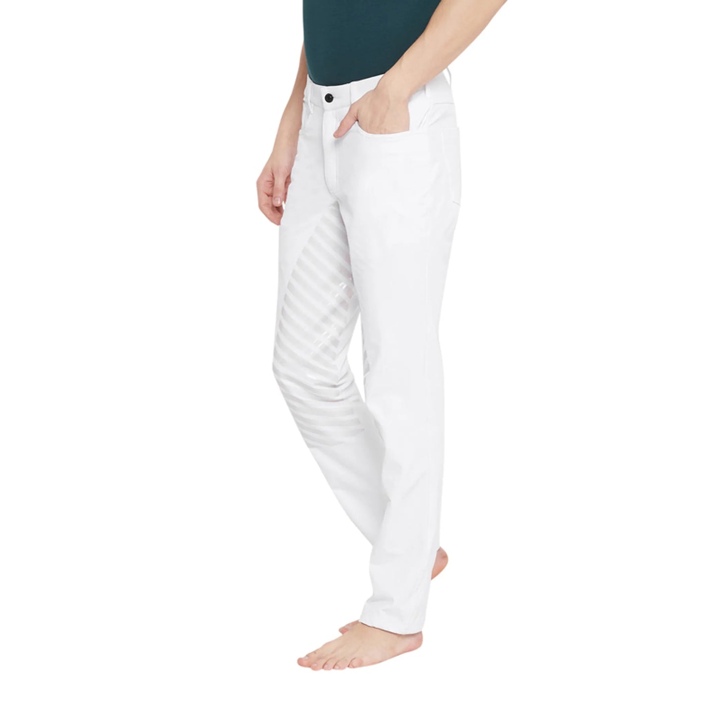 Woman wearing white TuffRider Technical Polo Pants standing barefoot with one hand in pocket against white background