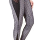 Close-up of person wearing TUFFRIDER MINERVA DAMASK TIGHTS with mesh side pocket and damask pattern design.