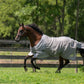Horse running in a green pasture wearing the TuffRider NevaTear Technical Standard Neck Fly Sheet-Silver-69