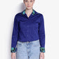Woman wearing TuffRider Ladies ADEY Double Collar Shirt-Royal Blue -L with floral collar and cuffs in casual pose