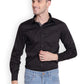 Man wearing TuffRider Mens ADEY Shirt-Black -2XL smiling with hand near buttons, dressed in light blue jeans.